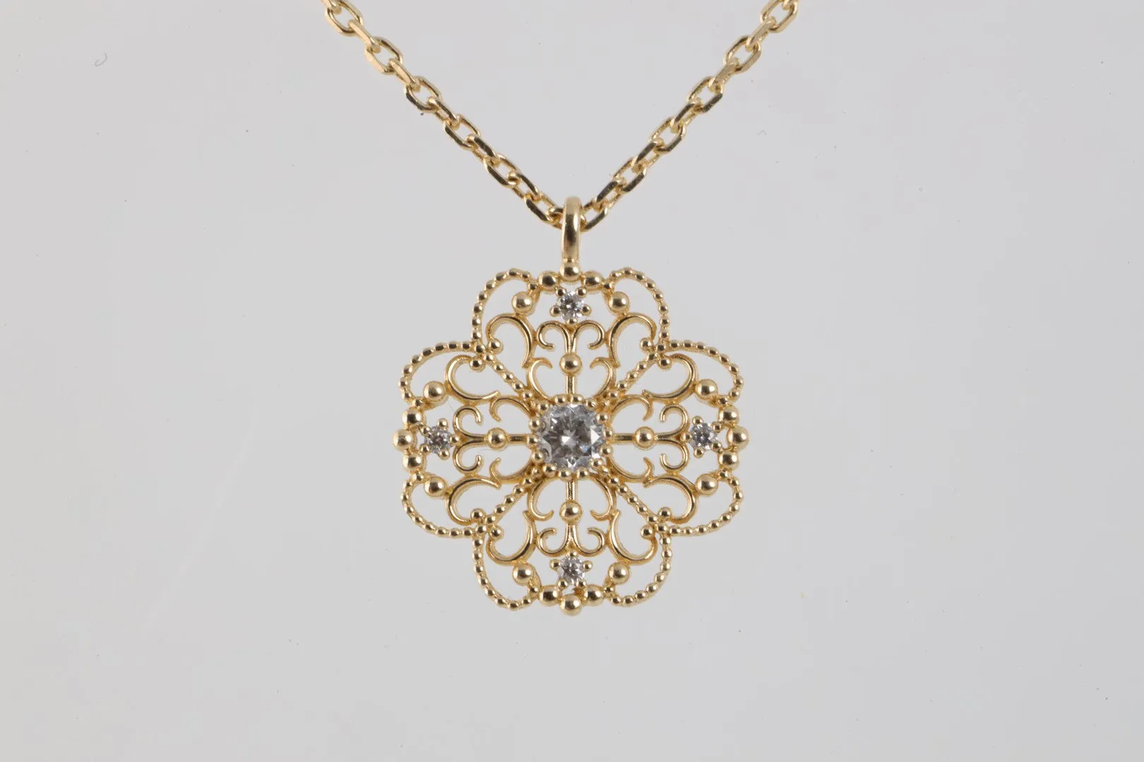 18'' 14k Yellow Gold 0.19tcw Diamond Flower Necklace (3.48g.)