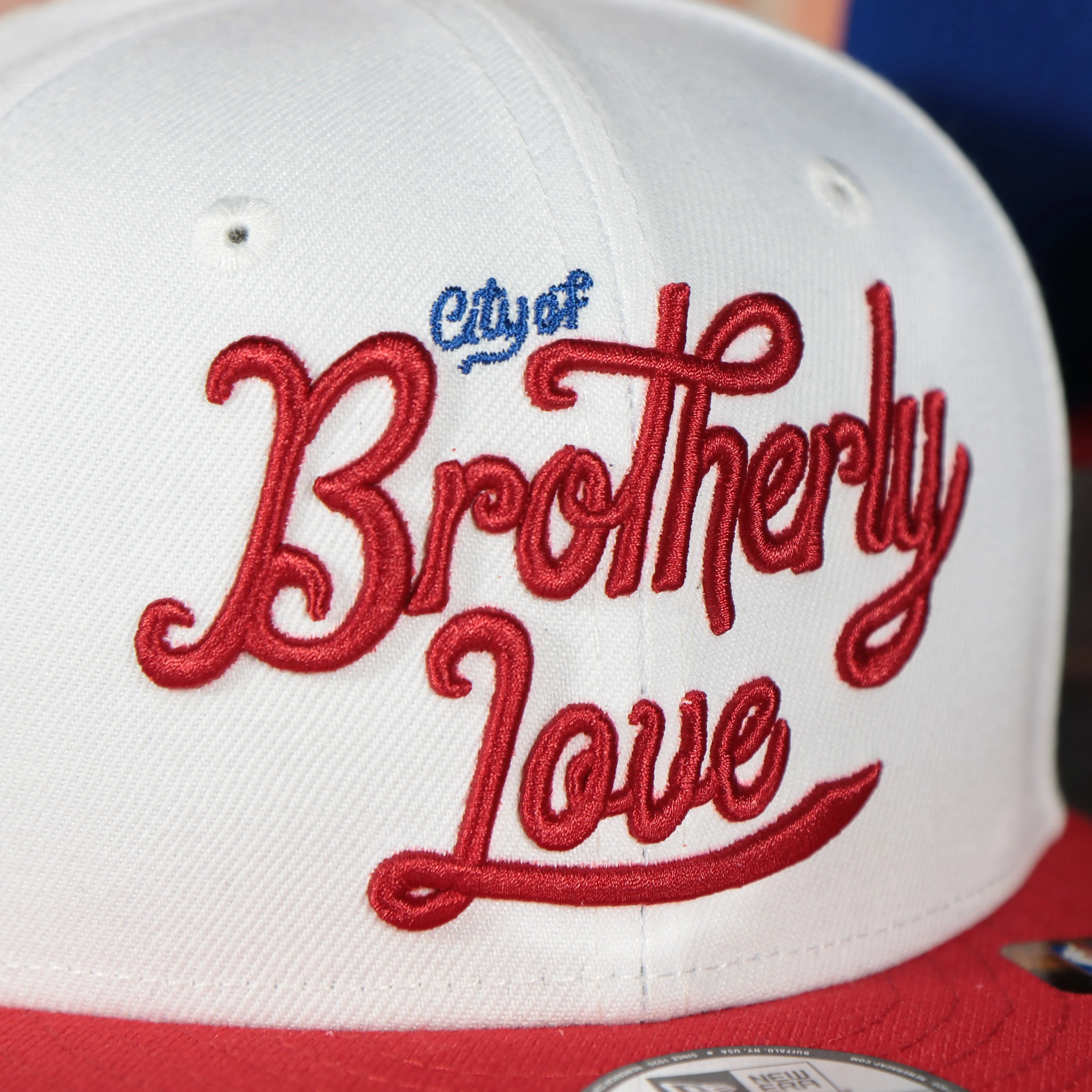 Philadelphia 76ers 2022 City Edition City Of Brotherly Love Blue Bottom Youth 9Fifty Side Patch Snapback Cap | New Era, White