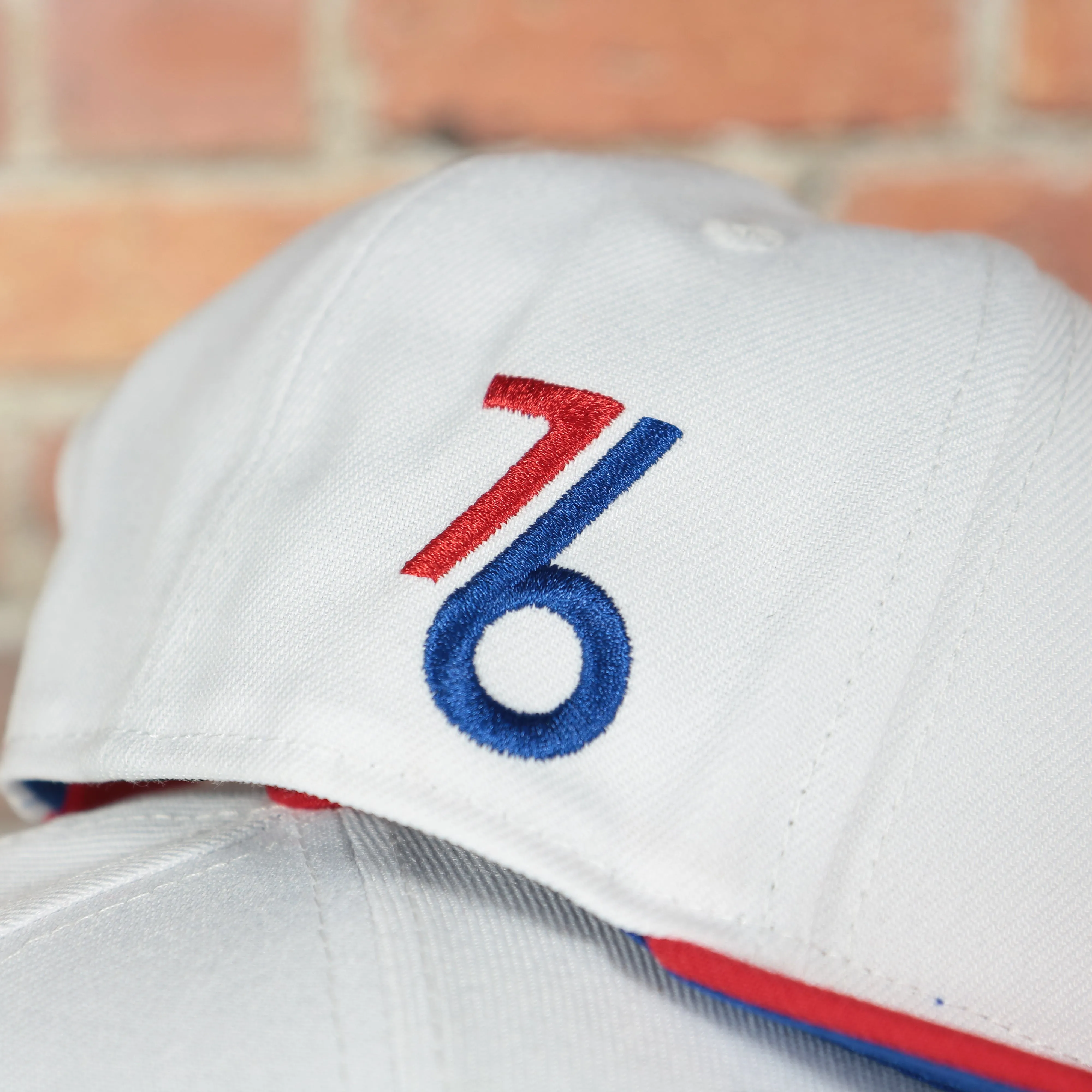 Philadelphia 76ers 2022 City Edition City Of Brotherly Love Blue Bottom Youth 9Fifty Side Patch Snapback Cap | New Era, White